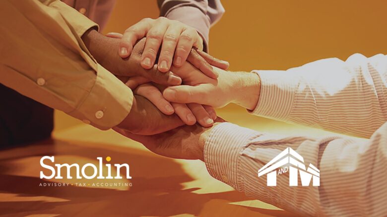 a group of businesspeople holding hands in support. Logos over the picture for Smolin Advisory, Tax, and Accounting and for T & M